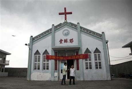 Toppled crosses in China spur defiance in The Associated press